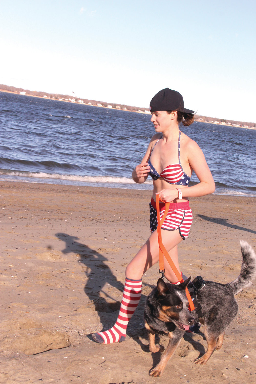 PATRIOTIC ATTIRE: One participant – we can’t vouch for whether she went into the water - brought along company for the event.